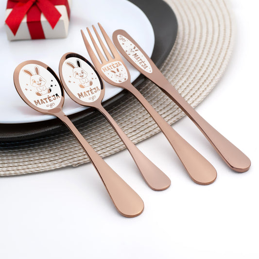 Personalized cutlery set for girls with engraved name and adorable bunny design. Ideal Christmas gift for toddlers, daughters, or granddaughters. Cute utensils made for little hands, promoting independence at mealtime. Perfect keepsake for holiday memories.